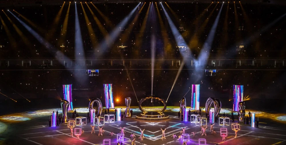 The lighting design was carefully crafted to captivate both the live audience at Jaber International Stadium and viewers watching the broadcast worldwide