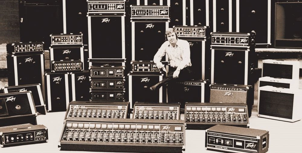 Hartley Peavey with an assortment of Peavey's most iconic products